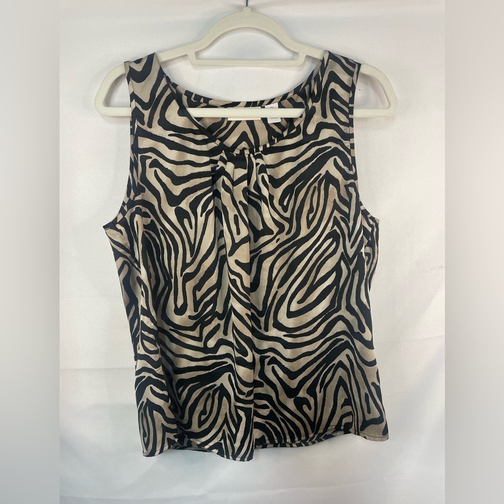 Chicos beautiful brown on brown zebra print blouse. Silky and slightly stretchy